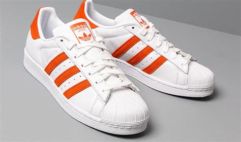 Adidas orange and white